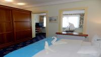 Postel nebo postele na pokoji v ubytování Hotel Deutsche Flagge