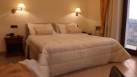 Postel nebo postele na pokoji v ubytování Resort Santangelo & SPA