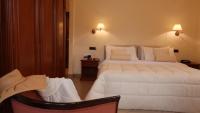 Postel nebo postele na pokoji v ubytování Resort Santangelo & SPA
