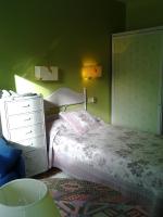 A bed or beds in a room at Hotel Solpor