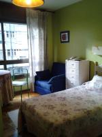 A bed or beds in a room at Hotel Solpor