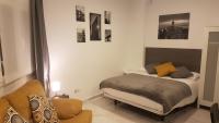 Posteľ alebo postele v izbe v ubytovaní Alcazaba Home City Centre