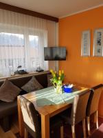 A seating area at Ferienwohnung Stock