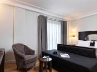 Postel nebo postele na pokoji v ubytování Acropolis Hill Hotel