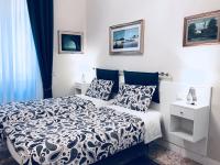 A bed or beds in a room at Nori Guest House