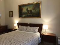 A bed or beds in a room at Nori Guest House