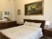 A bed or beds in a room at Nori Guest House