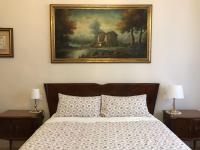 A bed or beds in a room at Nori Guest House