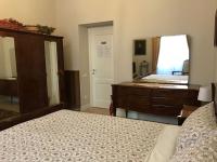 A bed or beds in a room at Nori Guest House