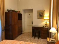 A bed or beds in a room at Nori Guest House