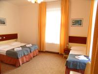 Postel nebo postele na pokoji v ubytování Hotel Atos