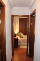 Postel nebo postele na pokoji v ubytování Apartamentos Balcón de la Vega