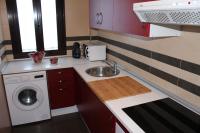 Kuchyň nebo kuchyňský kout v ubytování Apartamentos Balcón de la Vega