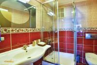a bathroom with a sink and a shower at Hotel Grand Emin in Istanbul
