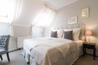 Postel nebo postele na pokoji v ubytování Boutique Hotel U Solné brány