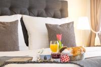 Postel nebo postele na pokoji v ubytování Boutique Hotel U Solné brány