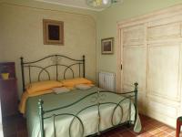A bed or beds in a room at B&B Villa Carmen