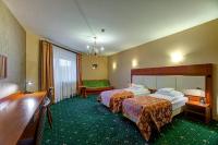 Łóżko lub łóżka w pokoju w obiekcie Hotel i Restauracja Bona