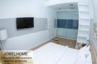 A bed or beds in a room at JobelHome