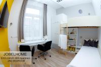 A bed or beds in a room at JobelHome
