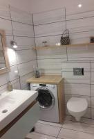 Kúpeľňa v ubytovaní Apartamenty Blisko Plaży Podczele