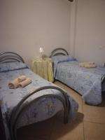 A bed or beds in a room at Al Ciclamino