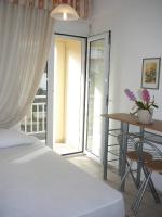 Posteľ alebo postele v izbe v ubytovaní Apartments Juli