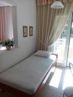 Posteľ alebo postele v izbe v ubytovaní Apartments Juli