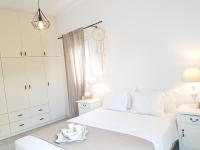 Postel nebo postele na pokoji v ubytování Artemis Sunny Villa