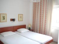 Posteľ alebo postele v izbe v ubytovaní Apartments Juli