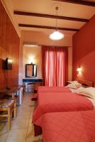 Postel nebo postele na pokoji v ubytování Hotel Varonos