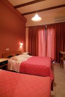 Postel nebo postele na pokoji v ubytování Hotel Varonos