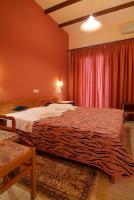 Postel nebo postele na pokoji v ubytování Hotel Varonos