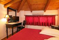 Postel nebo postele na pokoji v ubytování Hotel Varonos