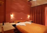 Postel nebo postele na pokoji v ubytování Hotel Varonos
