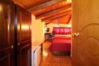 Postel nebo postele na pokoji v ubytování Hotel Varonos