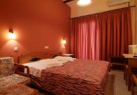 Postel nebo postele na pokoji v ubytování Hotel Varonos