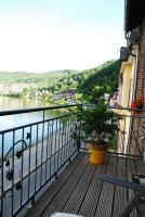a balcony with a view of a body of water at Mosel Dream in Cochem