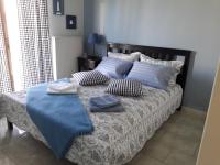 A bed or beds in a room at Τhe Roses House