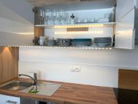 Kuchnia lub aneks kuchenny w obiekcie Finest Kitzblick Golf Suites by All in One Apartments