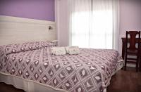 Hotel San Marinoにあるベッド