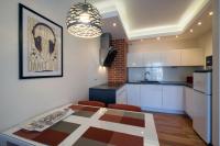 Łóżko lub łóżka w pokoju w obiekcie Apartamenty Starówka - Melody
