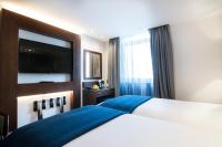 Montcalm Chilworth Townhouse, Paddingtonにあるベッド