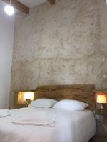 Posteľ alebo postele v izbe v ubytovaní Apartamentos Rurales Las Caleras
