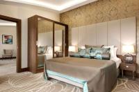 A bed or beds in a room at Ramada by Wyndham Yalova