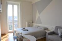 A bed or beds in a room at Aria di Casa - Navigli Darsena