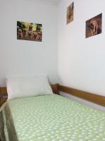Postel nebo postele na pokoji v ubytování Downtown Sunny Apartment
