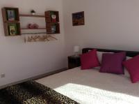 Postel nebo postele na pokoji v ubytování Downtown Sunny Apartment