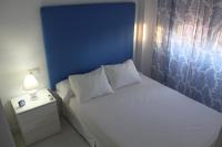 Postel nebo postele na pokoji v ubytování Luxury Duplex Las Palmeras