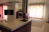 Kuchyň nebo kuchyňský kout v ubytování Luxury Duplex Las Palmeras